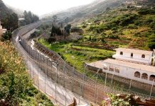 CIE: historia y derechos vulnerados Frontera de Ceuta desde el lado español.